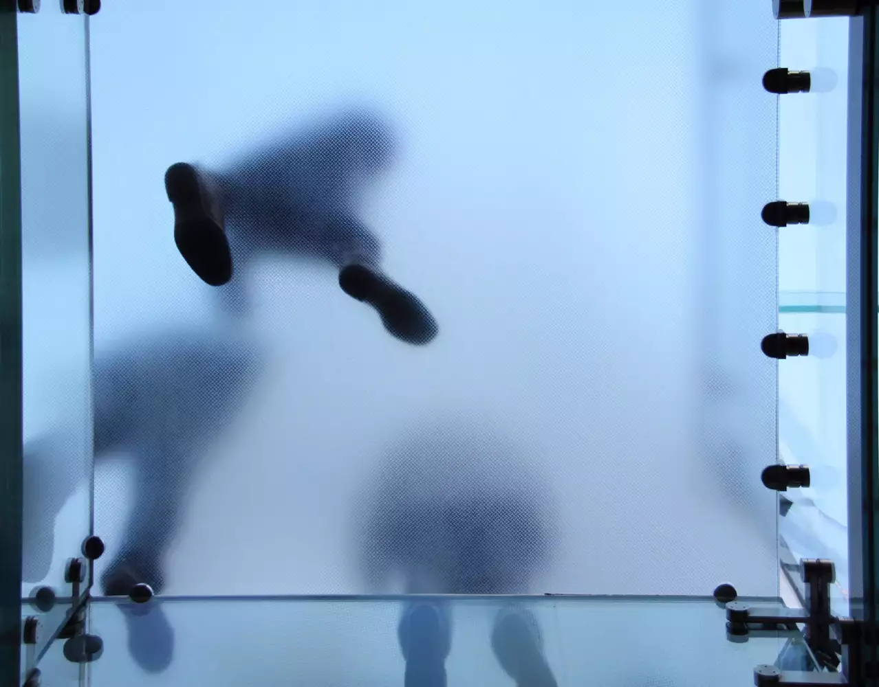 Frosted glass floor with visible foot traffic
